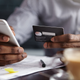 Illustration for article titled Cash, Cropped: Bank Fees Hit Black and Latinx Customers the Hardest, According to New Poll
